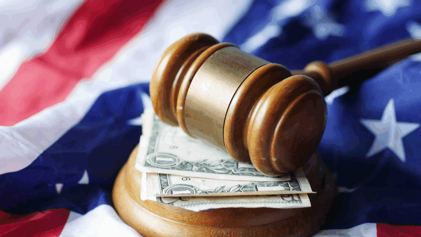 A Mallet on Top of Bills and American flag