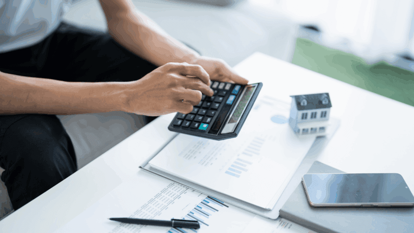 Tax specialist calculating meticulously to avoid clerical errors
