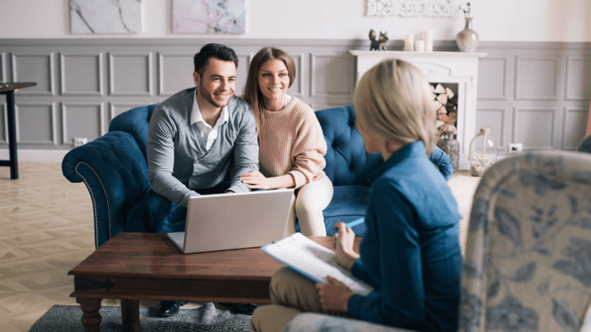 First time buyers reviewing new construction home loan program details