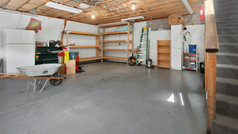 Empty garage interior before conversion into livable Houston home space