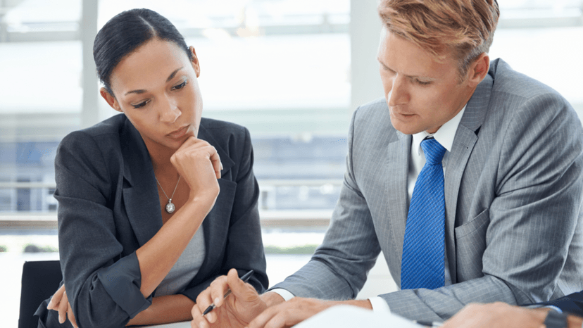 Business professionals reviewing a BPP tax appeal document together