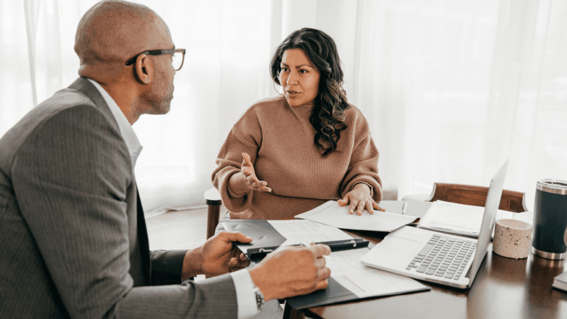 Client and advisor reviewing property tax appeal paperwork together