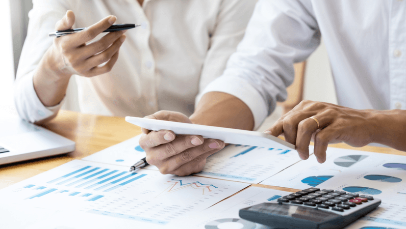 Property tax consultant discussing valuation records with a client