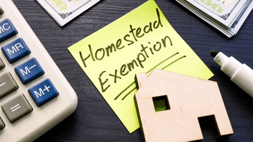 Texas homestead exemption concept with home model and calculator