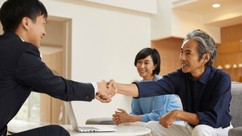 A tax professional meeting with clients to discuss a property tax appeal