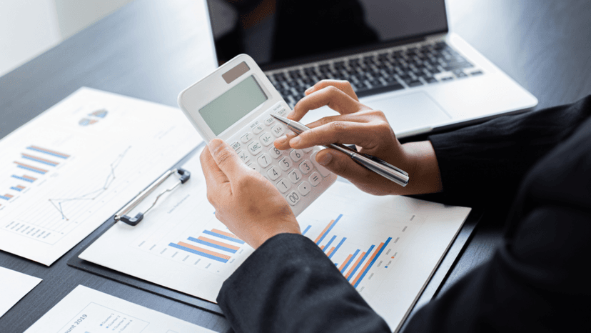 Professional calculating figures to dispute an overstated property tax assessment