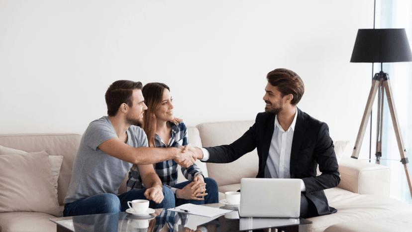Property owners meeting with a professional consultant to discuss tax protest strategy