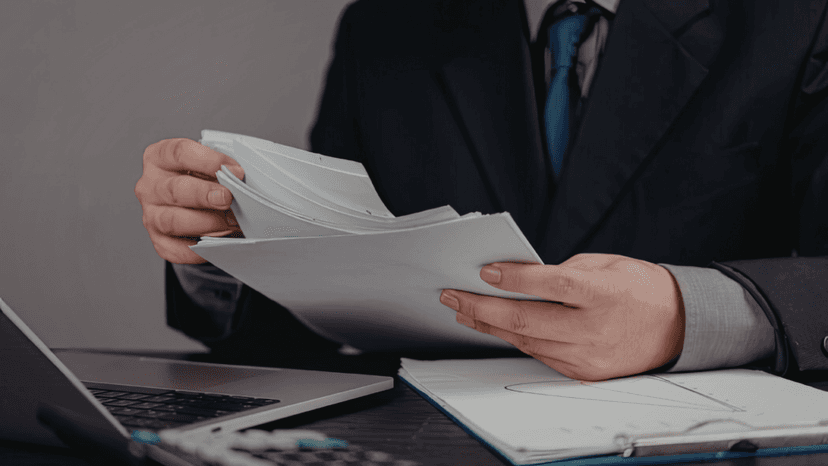 Tax consultant reviewing BPP rendition documents for Texas business filing