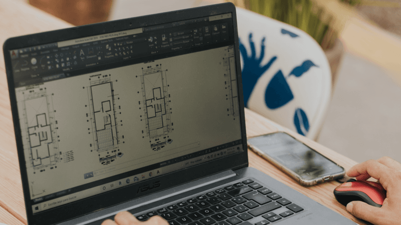 Architectural floor plans displayed on laptop screen